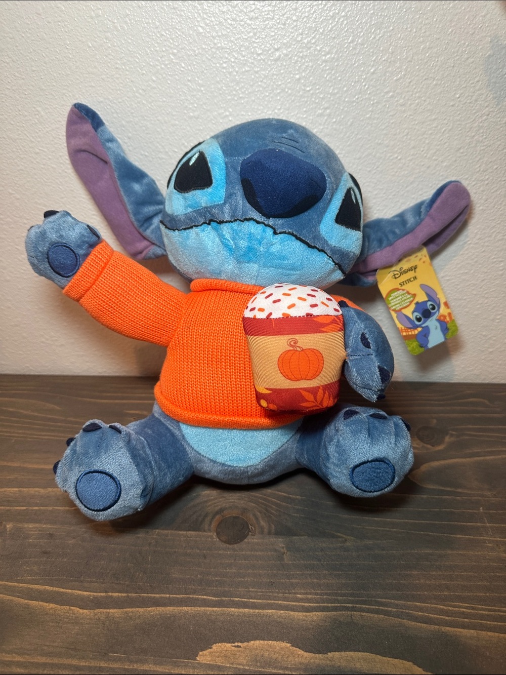Disney Blue Stitch Plush Wearing Orange Sweater Holding Pumpkin Mug